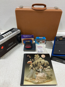 Record-o-matic Cassette Recorder, Quartz Clock, Vintage Gun Case, Llardo Book on Porcelain, Polaroid Camera