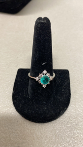 (1) Size 10 Faceted Blue- Green Oval Cut .925 Ring