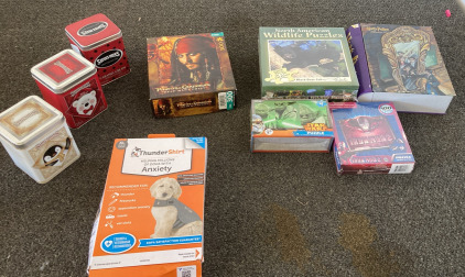 Pirates Of The Caribbean Puzzle,North American Wildlife Puzzle (Black Bear Cub), Star Wars Yoda Puzzle,Ironman 2 Puzzle Harry Potter Book Tin Case Including Swiss Miss Cans Thunder Shirt For Dogs With Anxiety