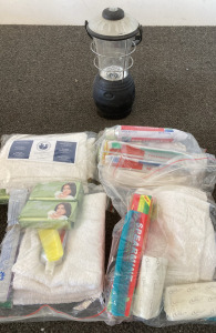 Wind Up Camping Lamp With Toiletries Including Toothbrush, Toothpaste And Soap And Towel ,Combs