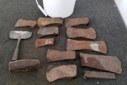 Bucket Of Rusted Axe Heads