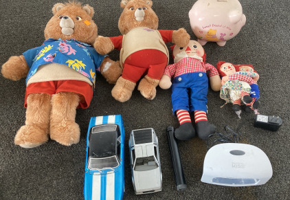Teddy Ruxpin Teddybears, Raggedy Ann& Andy Dolls 2 Model Cars includes 1968 Camaro Z/28 And AMC Delorean Camera Holder ,Nail Dryer And Piggy Bank