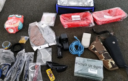 2 Gun Holsters, 2 Non Stick Loaf Pans 24 Pack Of Thank You Cards 2 Gun Scopes 2 Pairs Shoe Insoles Piggy Bank Sunglasses Hand Woven Bracelets