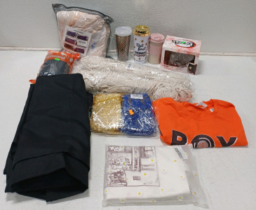 (1) 2X Shirt (2) Large Macrame (2) Black Curtians Blue & Gold Gift Bags (1) Couch Cover & More