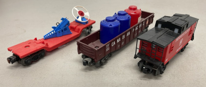 (3) Lionel Electric Train Cars&hellip; Postwar 3349 Turbo Missle Car W/ True Blue Launch Mechanism, Canadian Pacific Long Gondola Car 6205, Pennsylvania Caboose 92803