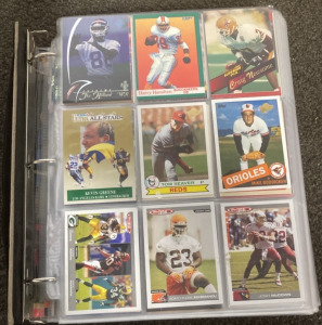 Binder Full Of Collectible Football, Basketball, And Baseball Cards