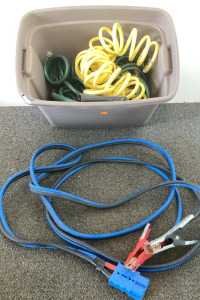 Service Components And A Tote Full Of Water Hoses