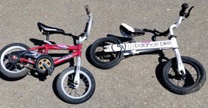 Set Of 2 Children Bikes Including A Balance Bike And A Huffy Rock it Bike