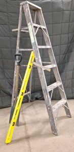 (1) 6" Aluminum Step Ladder, (1) Square Headed Shovel, (1) 48" Level & (1) 24" Aluminum Square. In Specialty On SP-8