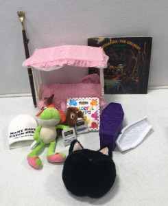 (1) Toy Bed (1) Fork Back Scratcher (2) Books (1) Cat Ears Earmuffs & More