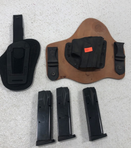 (1) Bianchi Holster (1) Crossbread Holster (3) .40 Caliber Magazines