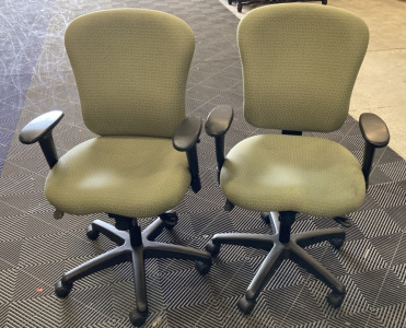 (2) Matching Green Patterned Rolling Desk Chairs
