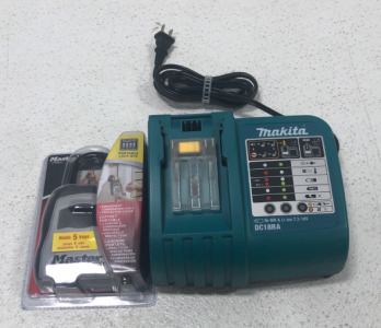 (1) Working Makita Battery Charger (1) Master Lock Key Box