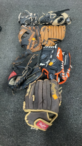 (7) Baseball Mitts, (1) Shin Cover, (2) Helmets , Protective Gear