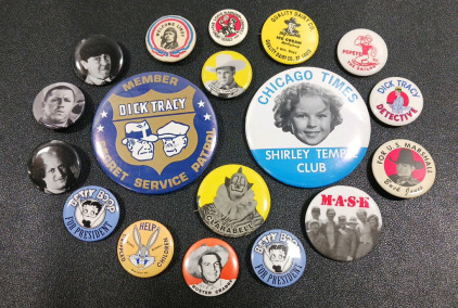 (18) Assorted Collectible Pins Including 3-Stouges, Shirley Temple, MASH & More!