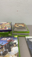 (1)Lot Of Many Video Games, (1) Xbox 360 Call of Duty “Ghosts” (1) TMNT 2 Xbox, (1) XBOX ATV 2, and many more Xbox and Xbox 360 Games