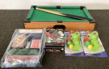 (1) Miniture Pool Table W/ Pool Sticks, (2) Sets Of Poker Chips, (2) Dino Blall Shooters W/ Foam Balls