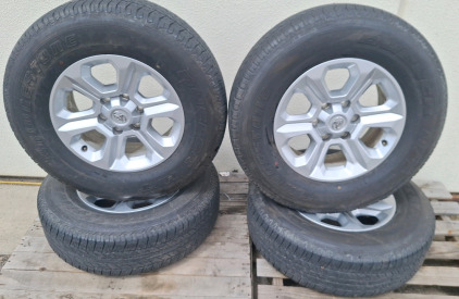 (4) Bridgestone 265/70R17 Tires w/ Toyota Wheels