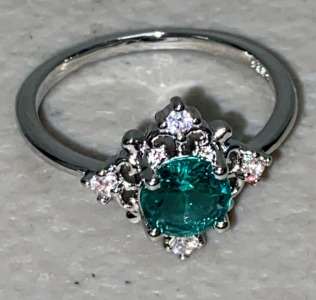 (1) Size 10 Faceted Blue-Green Oval Cut .925 Ring