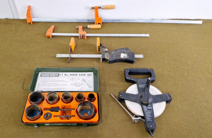 (1) Workshops 11Pc Hole Saw Set, (3) Carpenters Clamps & (1) Sears 100Ft Fiberglass Open Reel Tape Measure