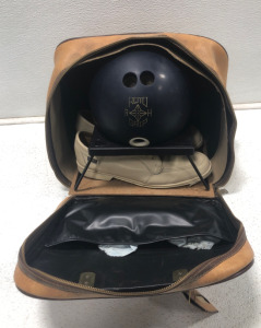 (1) Bowling Bag (1) Size 12 Bowling Shoes (1) Bowling Ball