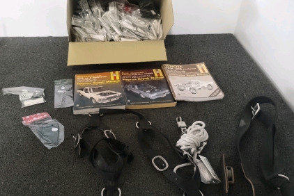 Box Full of Lamp Wicks, Tiny Welcome Signs, Haynes Repair Manuals