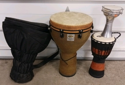 (1) 16" Remo World Percussion Djimbes Drum & Case (1) Toca 10" Djimbes Drum (1) 7" Metal Hand Drum