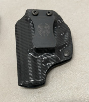 Pistol Accessoriesâ€¦ (2) Carbon Fiber Hip Holsters, (1) Falco Leather Hip Holster (4) Gun Locks - 4