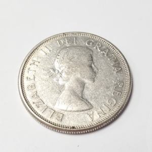 $80 Silver Canadian 50Cent (From 1960-1964 Random Year) Coin
