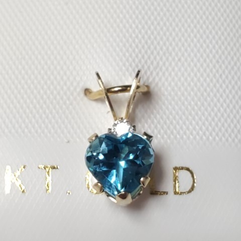 $500 10K Blue Topaz(0.95ct) Diamond(0.03ct) Pendant