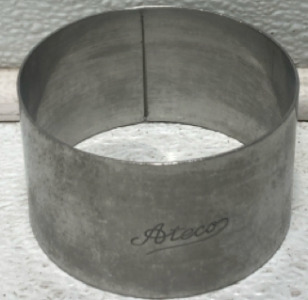 Box Filled With Round Pastry Molds