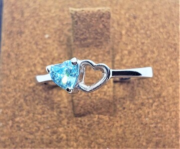 $100 Silver Blue Topaz Ring