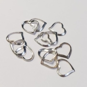 $60 Silver Pack Of 12 Floating Heart Set