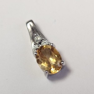$200 Silver Diamond And Citrine Pendant