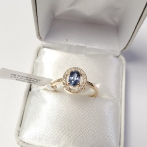 $2400 10K Sapphire (1ct) Diamond (0.085ct) Ring