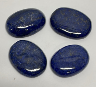 (4) Lapis Lazuli Cabochons Cut And Polished 56.3ct, 52.1ct, 44.3ct, And 44.0ct.