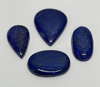 (4) Lapis Lazuli Cabochons Cut And Polished 43.8ct, 42.8ct, 35.1ct, And 25.6ct.