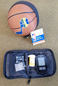 (1) ACCU-CHECK Aviva Blood Glucose Monitor W/Case & Strips & (1) Utah Jazz Basketball Lunchbag