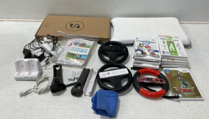 Assortment Of Wii Games (1) Wii Fit Balance Boards (3) Nintendo Wii Steering Wheels & Much More