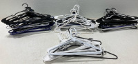 An Assortment Of Clothes Hangers (15) Non Slip Indoor Stair Covers (1) Wooden Foot Massager & More - 4
