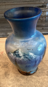 Elk with mountain range vase. EB