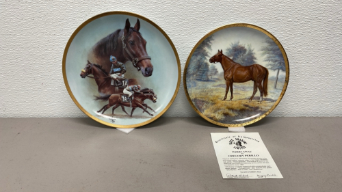 (1) American Artists Fred Stone Collectible Gold Leaf Trimmed Plate, (1) Vague Shadows Whirlaway By Perillo Gold Leaf Trimmed Plate. Both In Original Boxes. One W/ COA