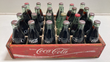 (22) Sealed Coca-Cola Glass Bottles, (2) Empty Glass Coke Bottles in Wood Box