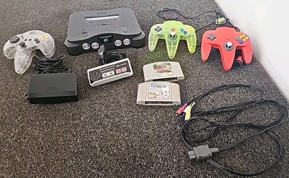Nintendo 64 W/ (4) Controllers & (2) Games