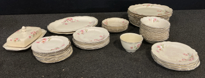 China Set With A Variety Of Different Sized Plates