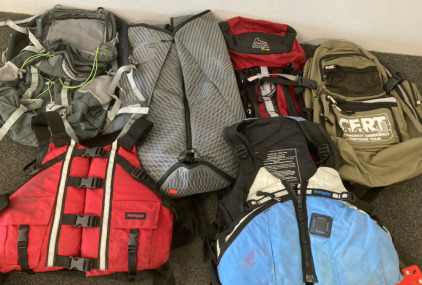 (4) Backpacks (2) life jackets