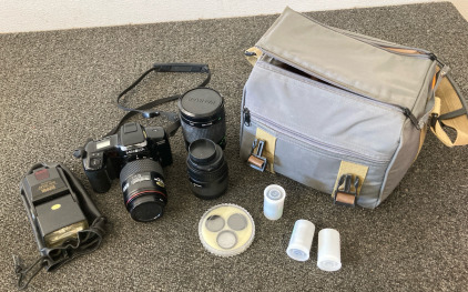Minolta Maxxum 5000i Camera, (2) Camera lenses, Film, & Flash Carrying Case