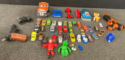 (34) Toy Cars, Toy Guns, Toy Binoculars, & A Small Helmet