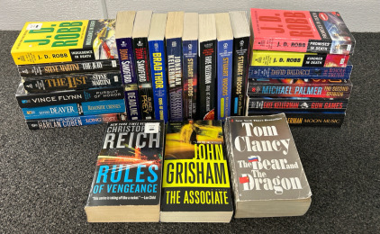 Assorted Thriller/Suspense Paperback Novels Featuring John Grisham, David Baldacci, & Tom Clancy