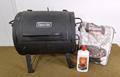 (1) Dyna-Glo Charcoal Grill W/ Briquettes & Lighter Fluid